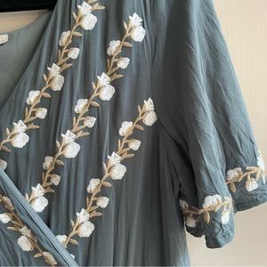 Wrap dress with floral embroidery